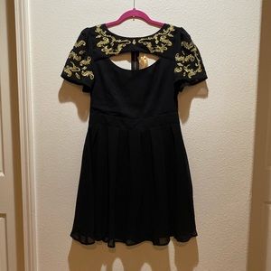 Black and gold dress